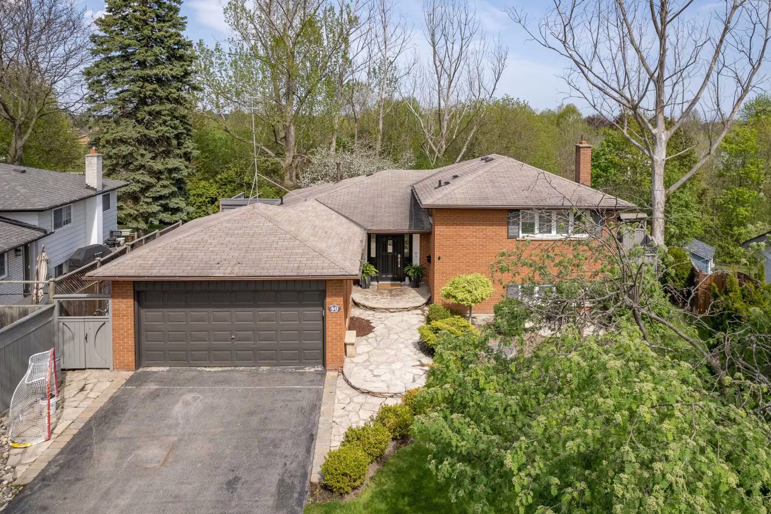 A brick raised bungalow with a double garage in Central West Ajax, near Old Pickering Village