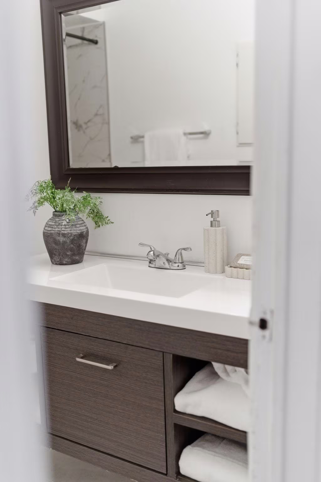 Updated main bathroom at 13 Rollo Drive, South East Ajax, with a solid surface trough sink
