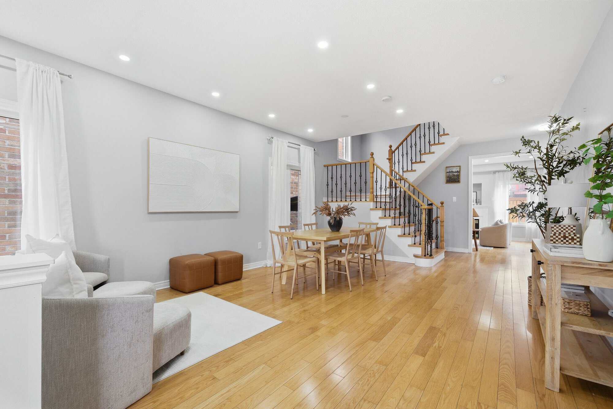 Front hallway at 131 Rushworth Drive, Ajax, opening into the dining room, with tile flooring