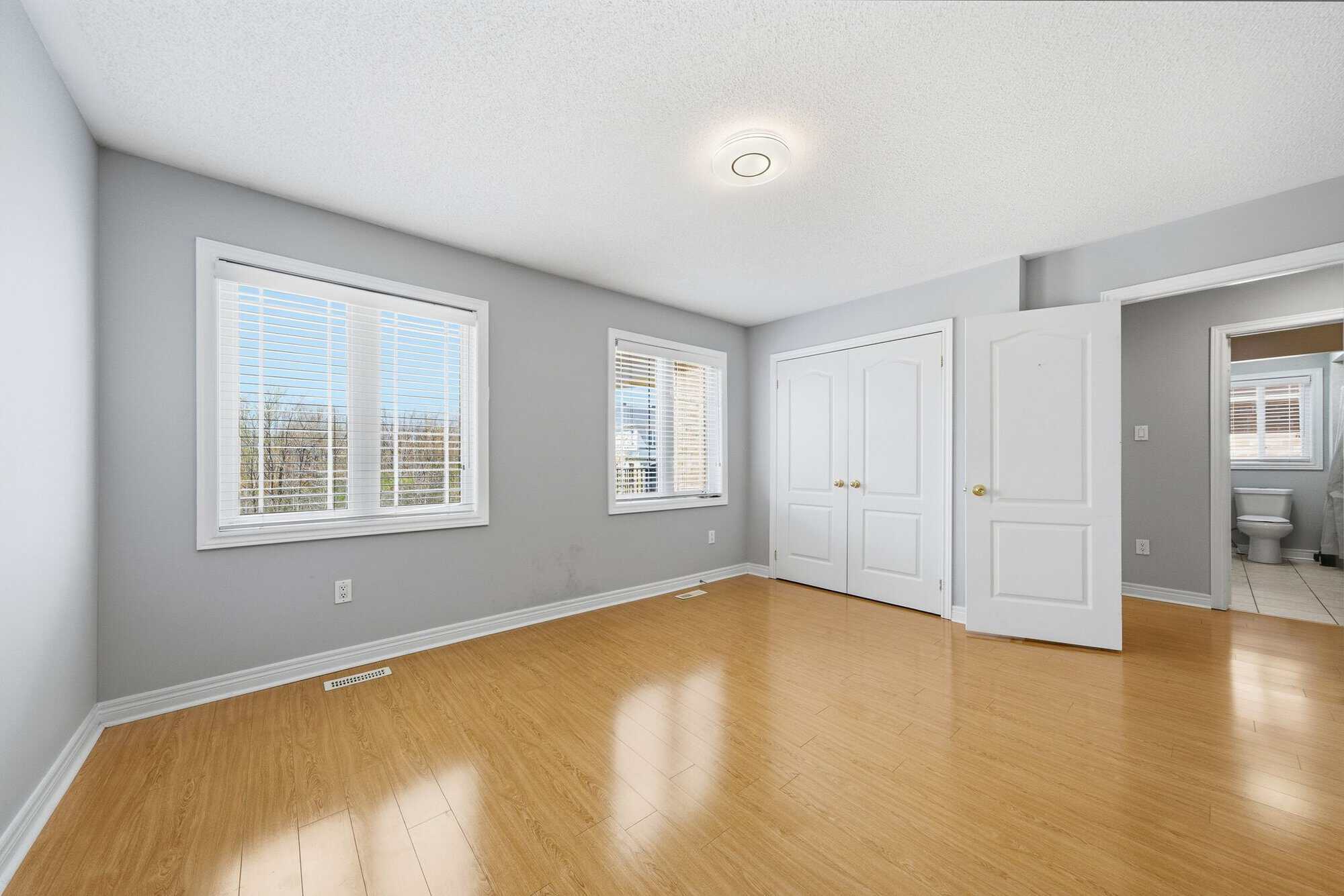 His and hers closets in the primary bedroom at 131 Rushworth Drive, Ajax