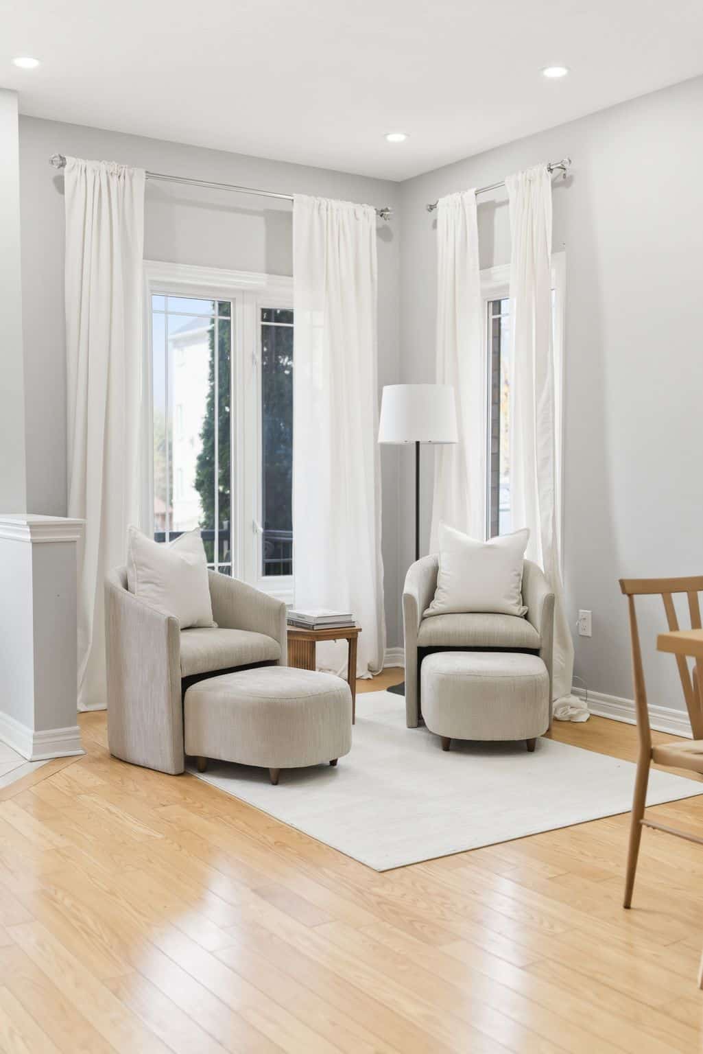 Sitting room at 131 Rushworth Drive, Ajax, looking out toward the front hall