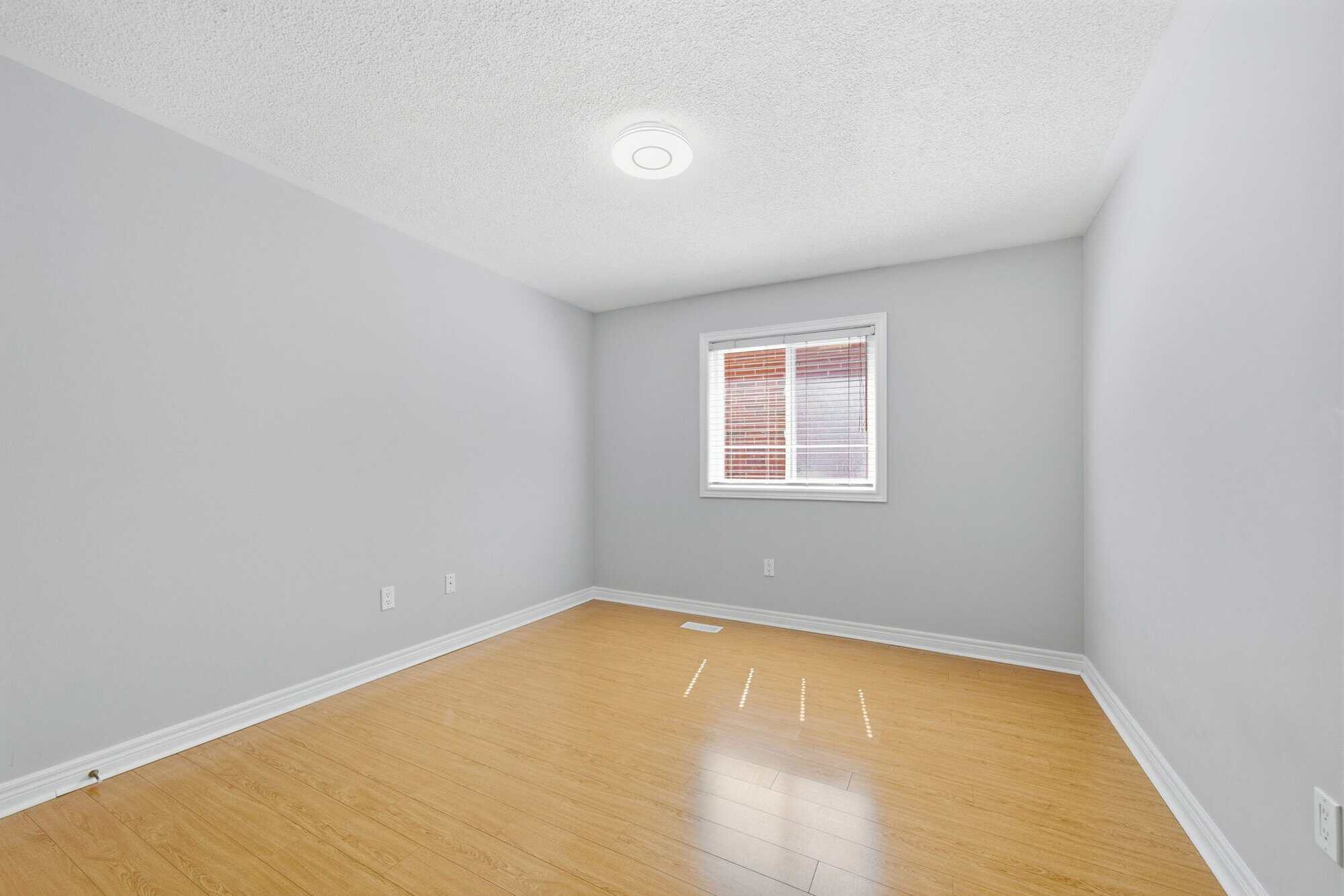 Third bedroom at 131 Rushworth Drive, Ajax, generous size with double closet