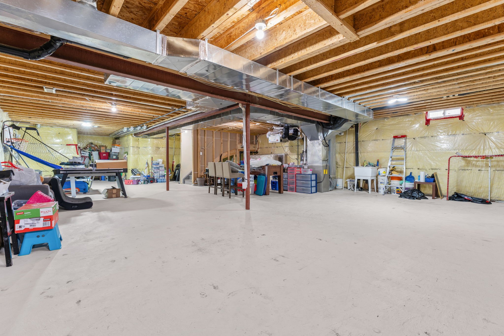 Unfinished basement at 1683 Finkle Drive, Oshawa, showing the full open layout ready for development