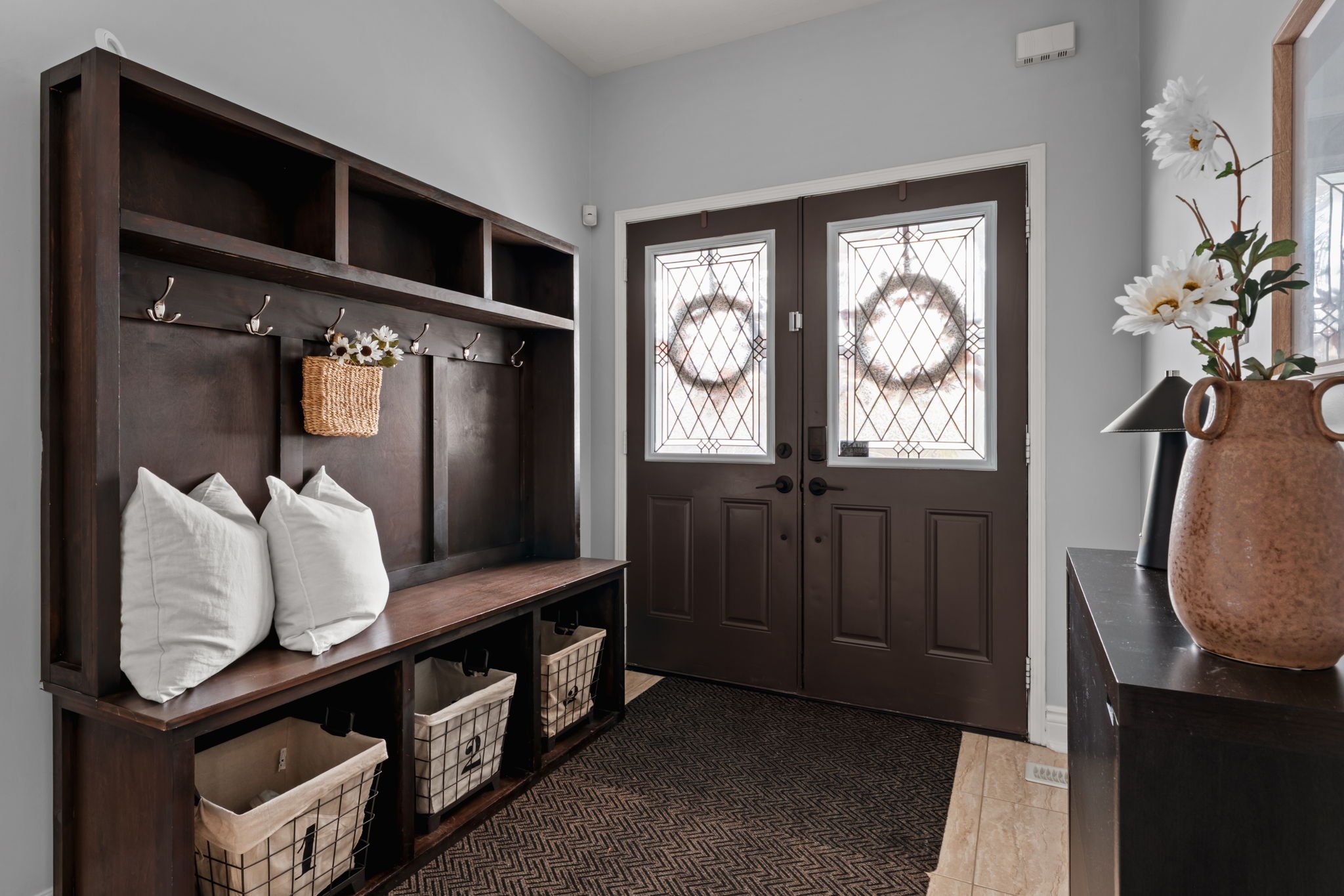 Front foyer and mudroom at 1683 Finkle Drive, Oshawa, with a custom bench, cubby storage and hooks