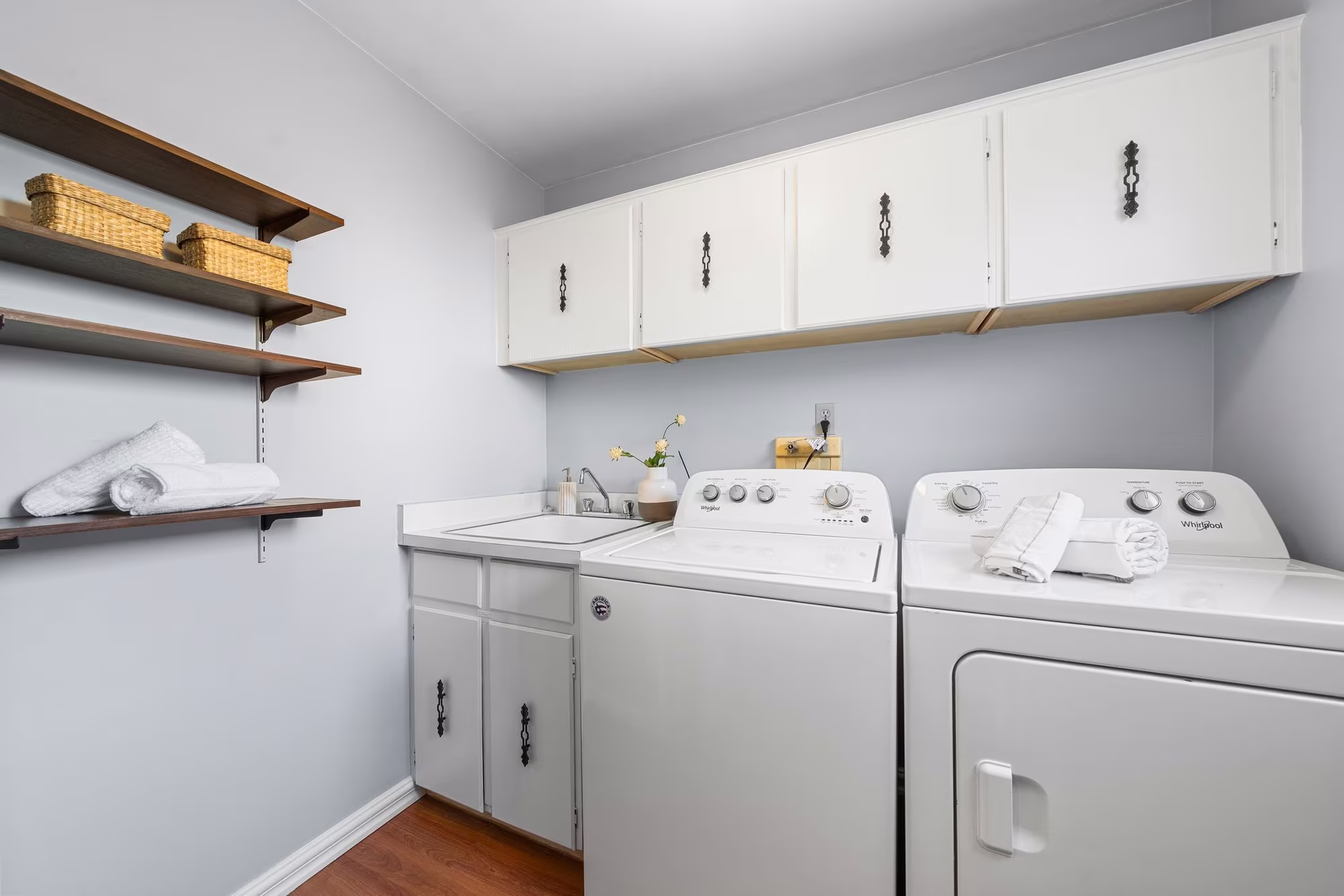 Main floor laundry room at 38A Deep Dene Dr, Highland Creek Village, with side door access