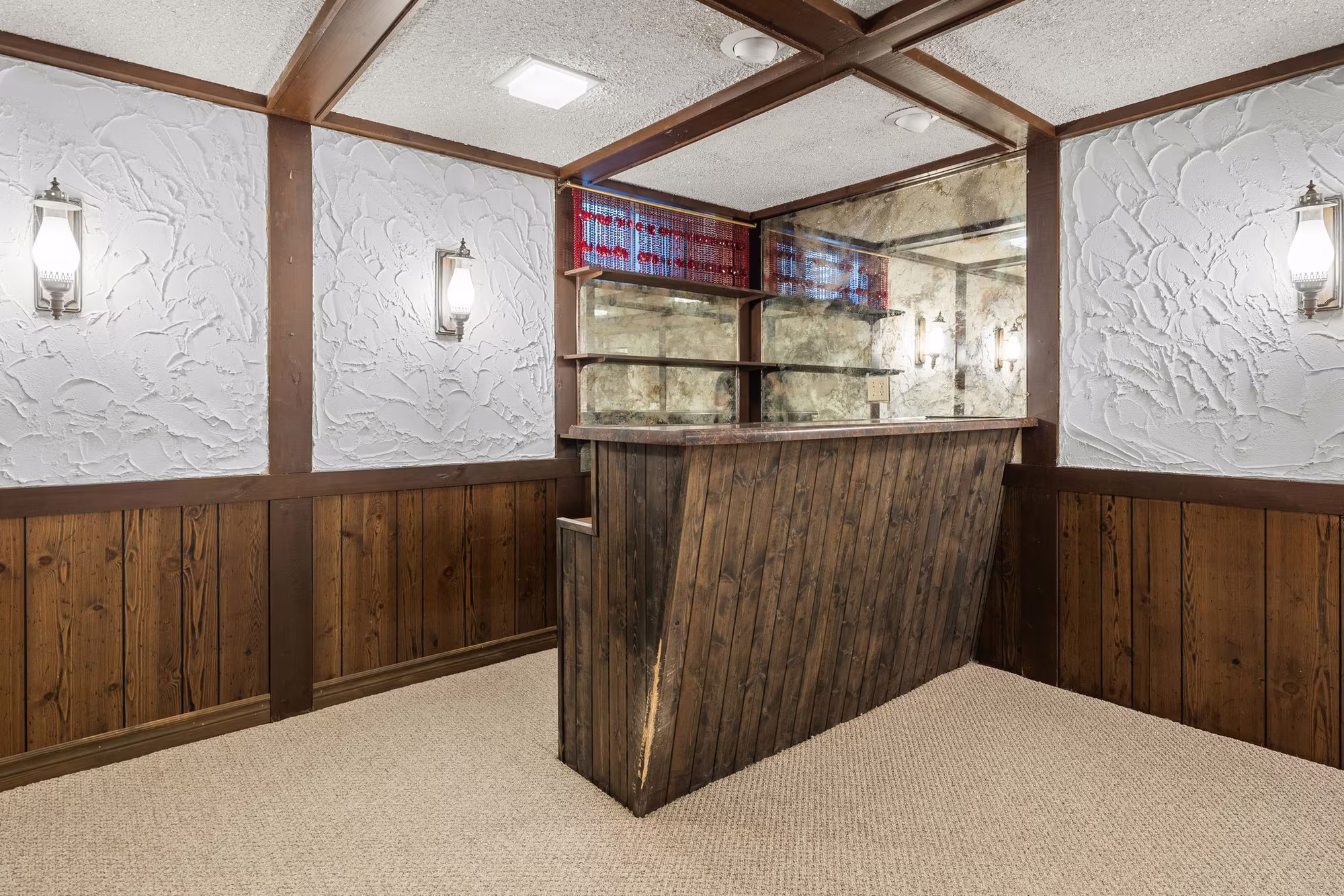 Built-in bar in the finished basement at 38A Deep Dene Dr, Highland Creek Village