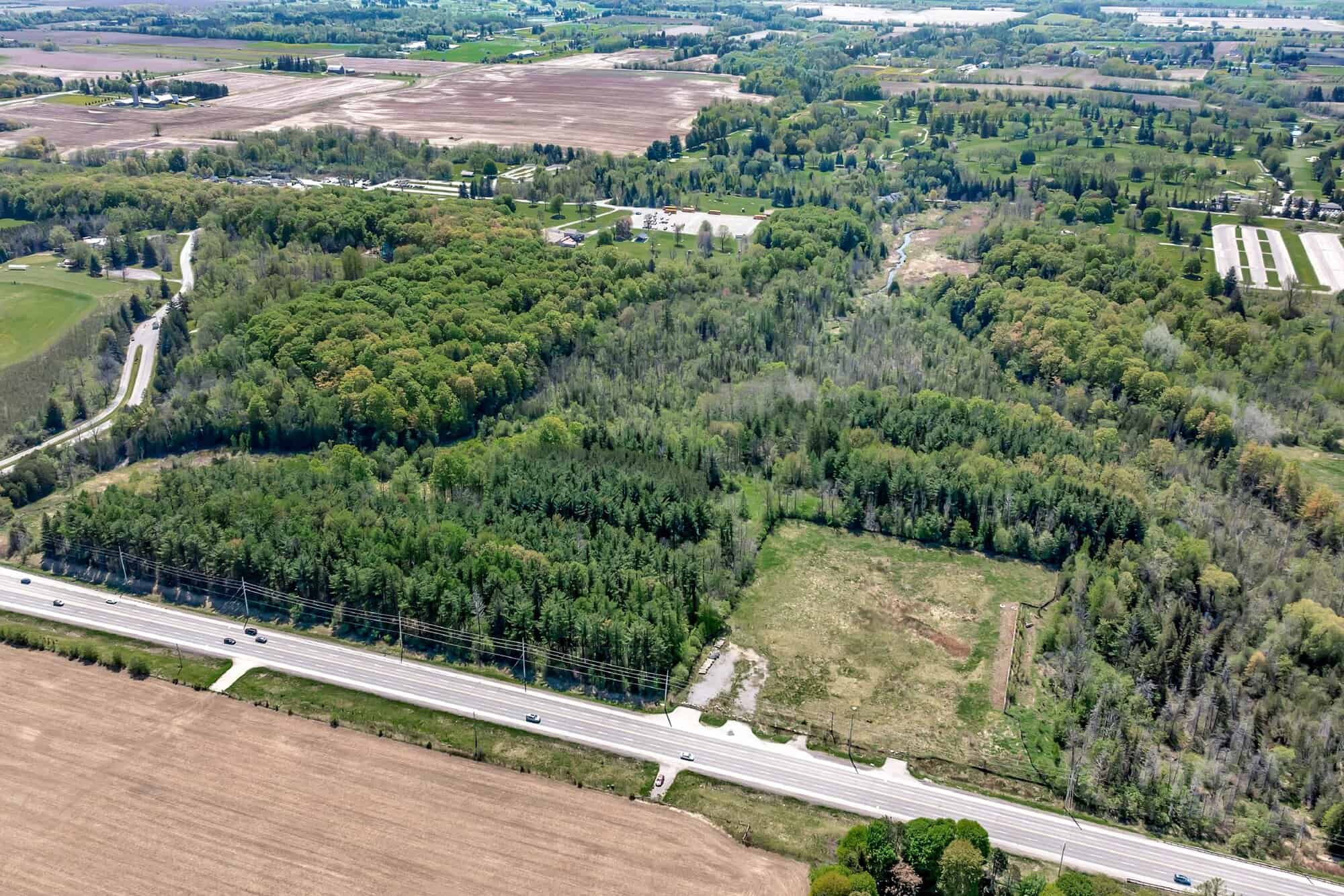 Aerial birdseye view of 3187 Stouffville Road, a Highway Commercial parcel in Whitchurch-Stouffville, York Region