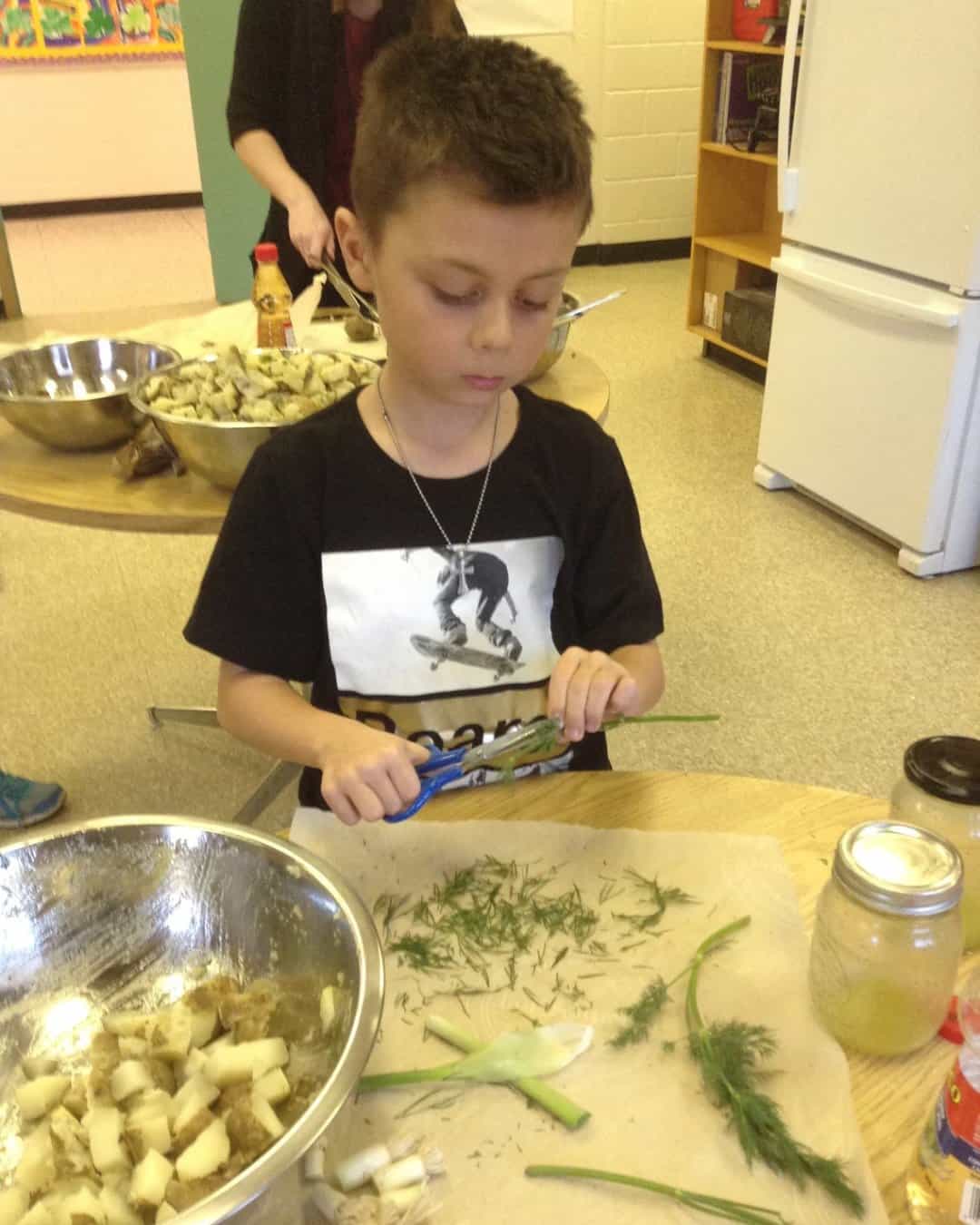 Junior Green Thumbs incorporates activities like cooking, to deepen the learning of farm to table and where food comes from