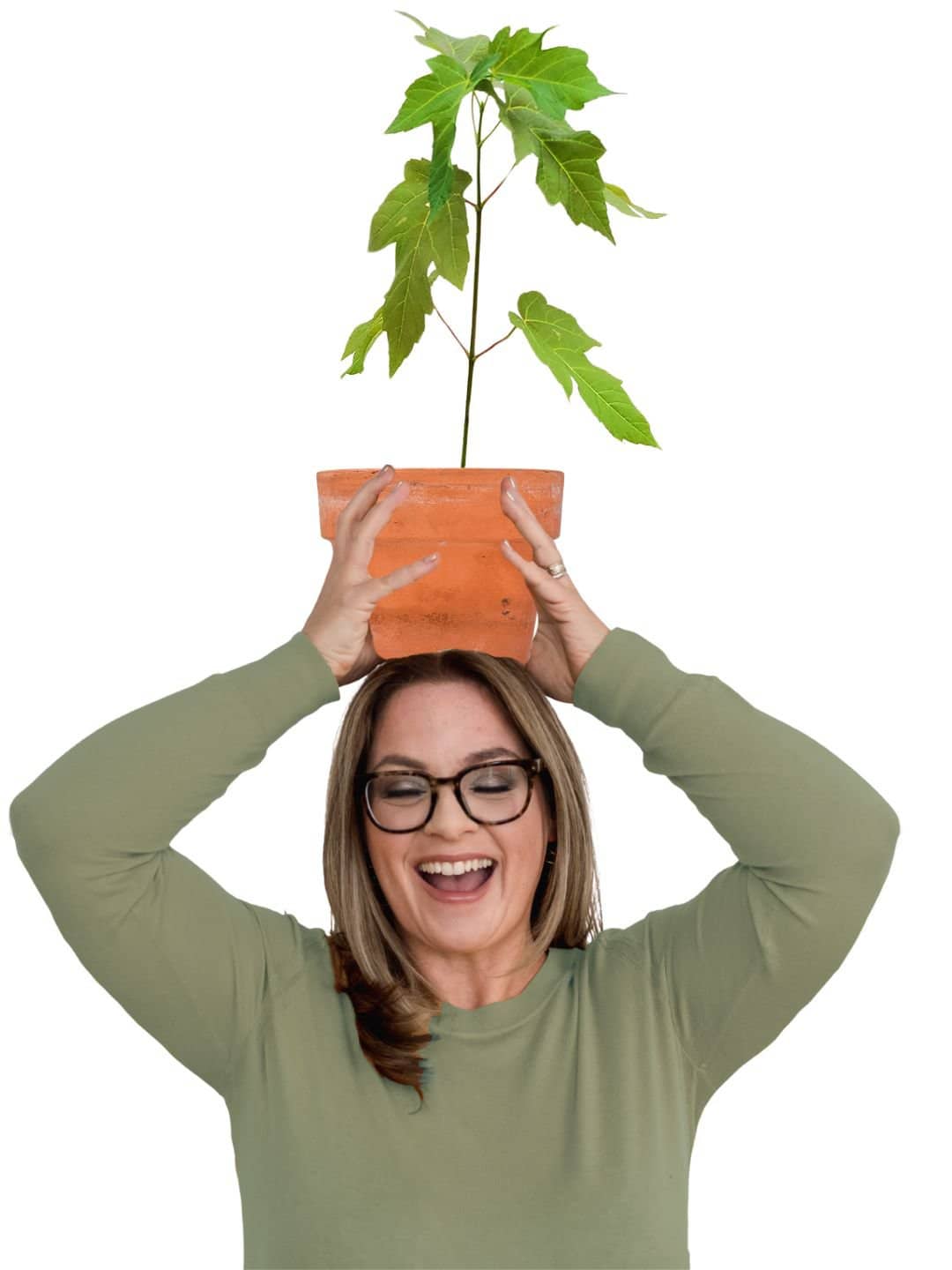 Laura McBride smiling and holding a red maple sapling above her head as part of the Sutton Tree Campaign