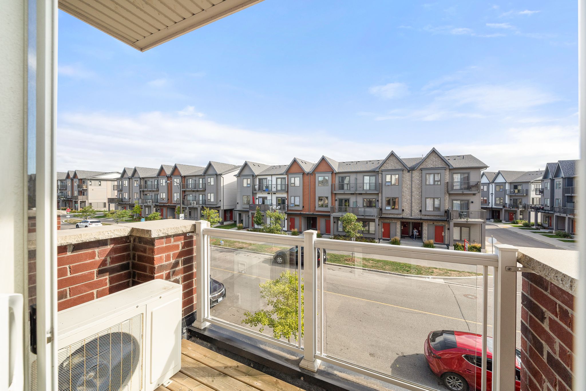 Private balcony view from 2598 William Jackson Dr Pickering stacked townhouse overlooking the Duffin Heights community.