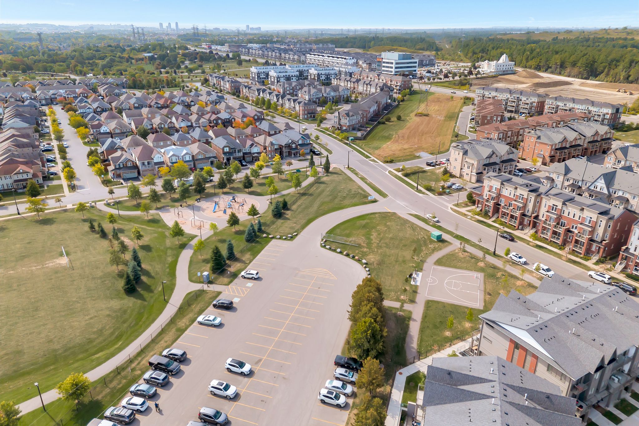Playground and guest parking near 2598 William Jackson Dr Pickering in Duffin Heights.