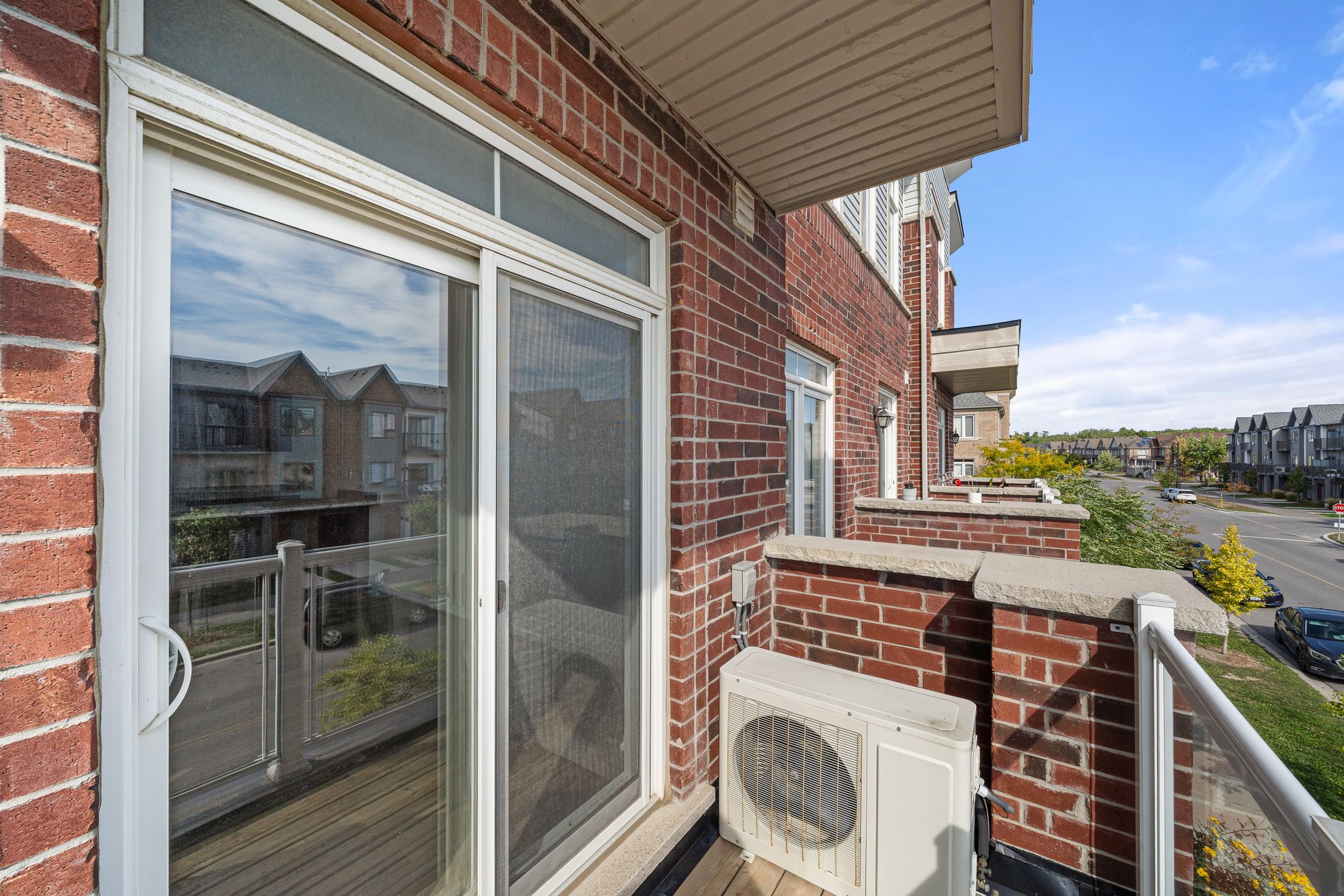 Private balcony view from 2598 William Jackson Dr Pickering stacked townhouse overlooking the Duffin Heights community.
