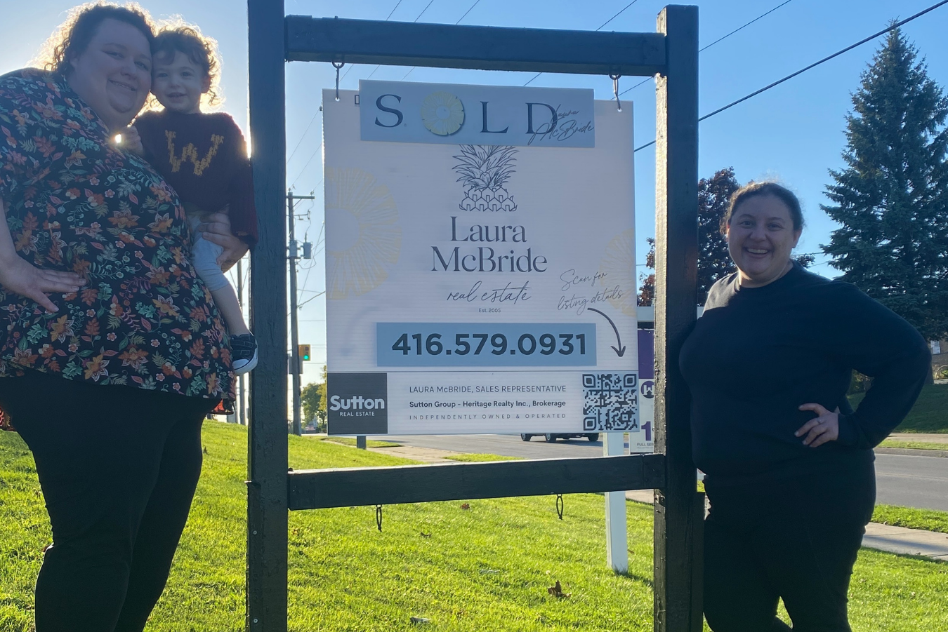 Happy co-buyer clients in Pickering after successfully selling their home before moving to their new one.