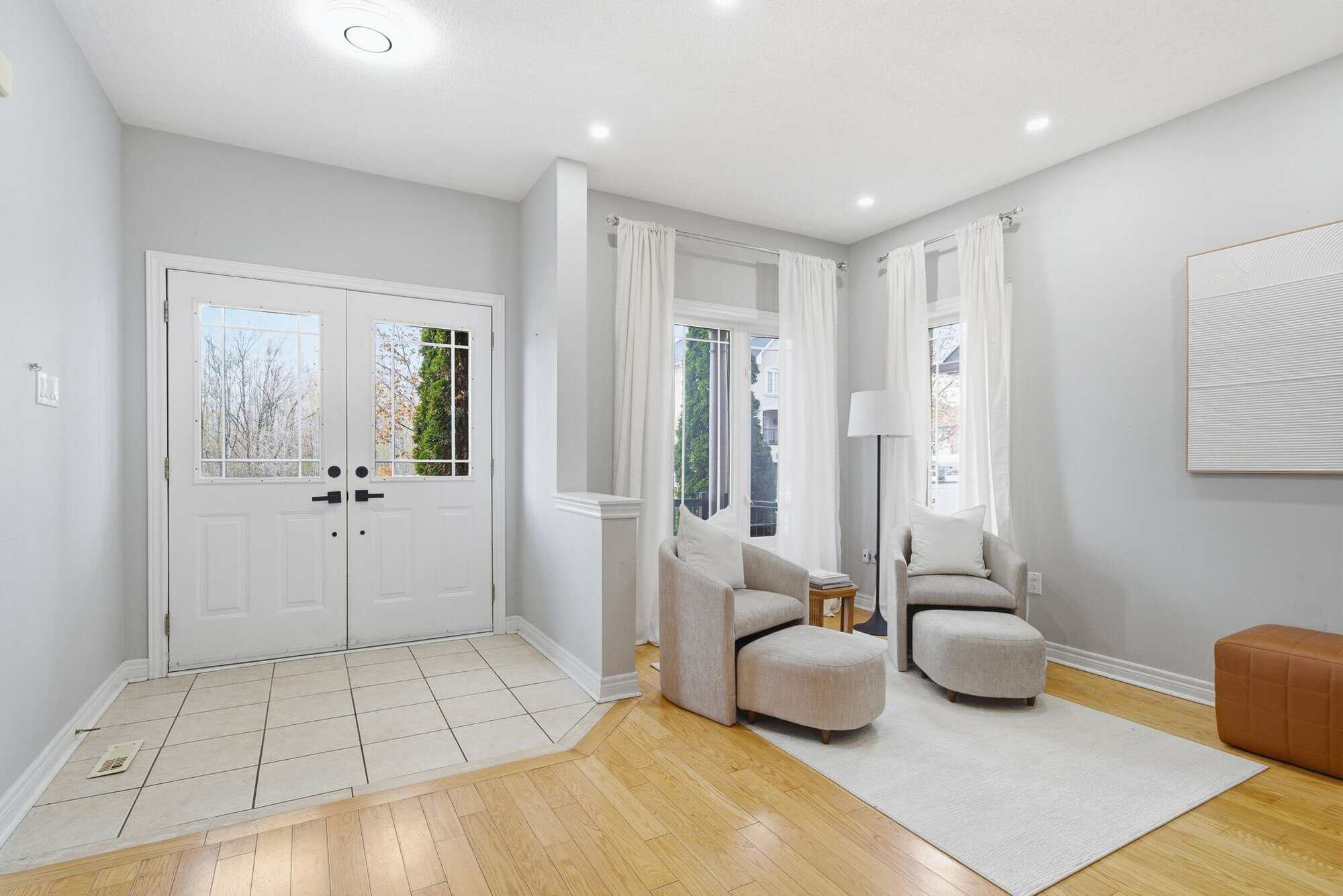 38A Deep Dene Front entrance with a peek into the living room