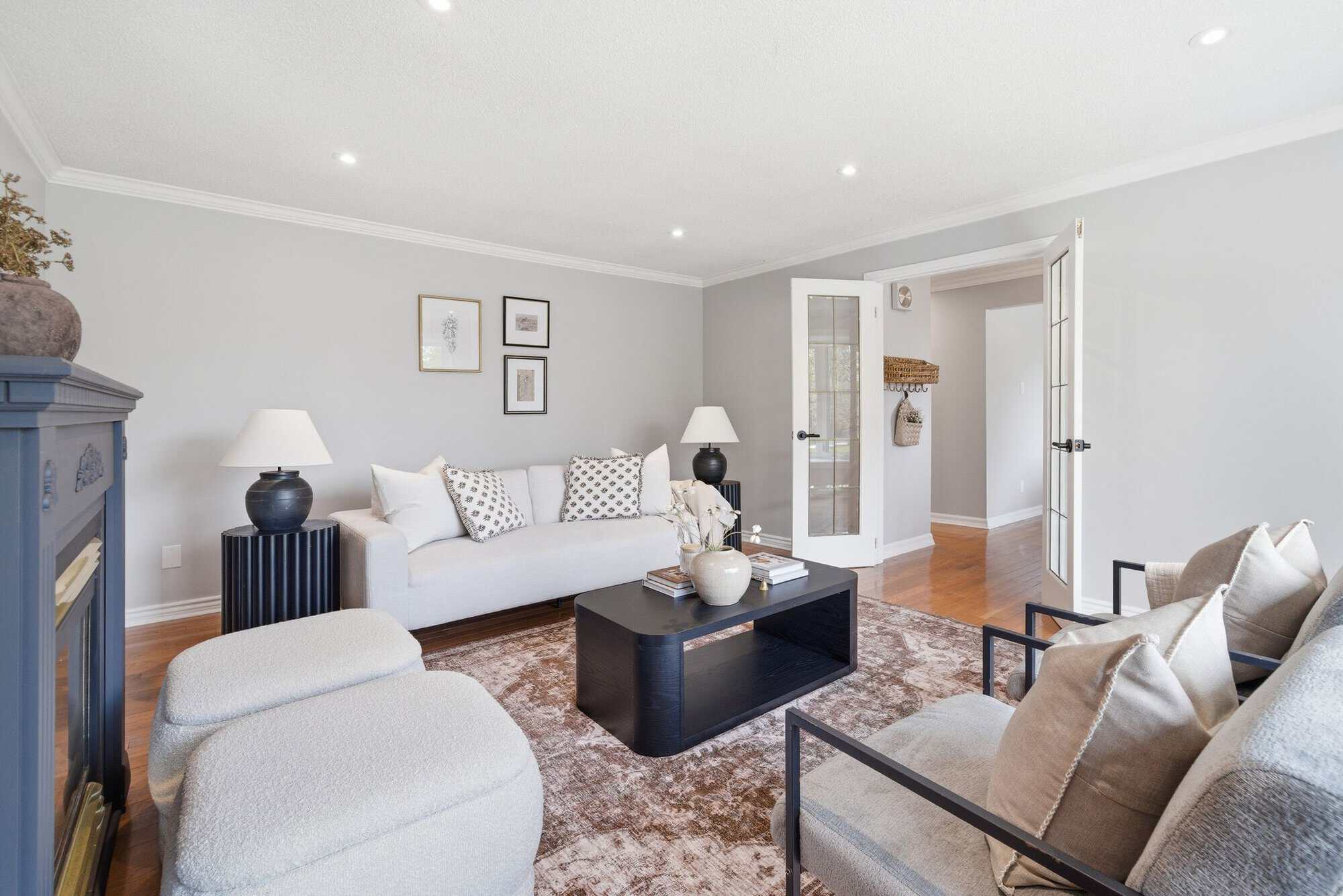 38A Deep Dene formal living room with crown moulding and updated lighting.
