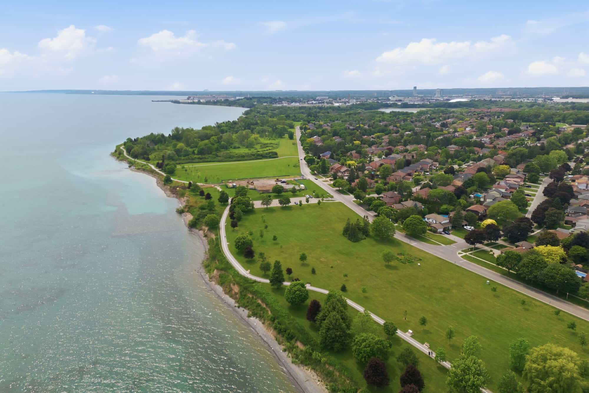 Aerial view of South Ajax near 39 Anstead Crescent, showing residential streets, mature trees, and Lake Ontario.