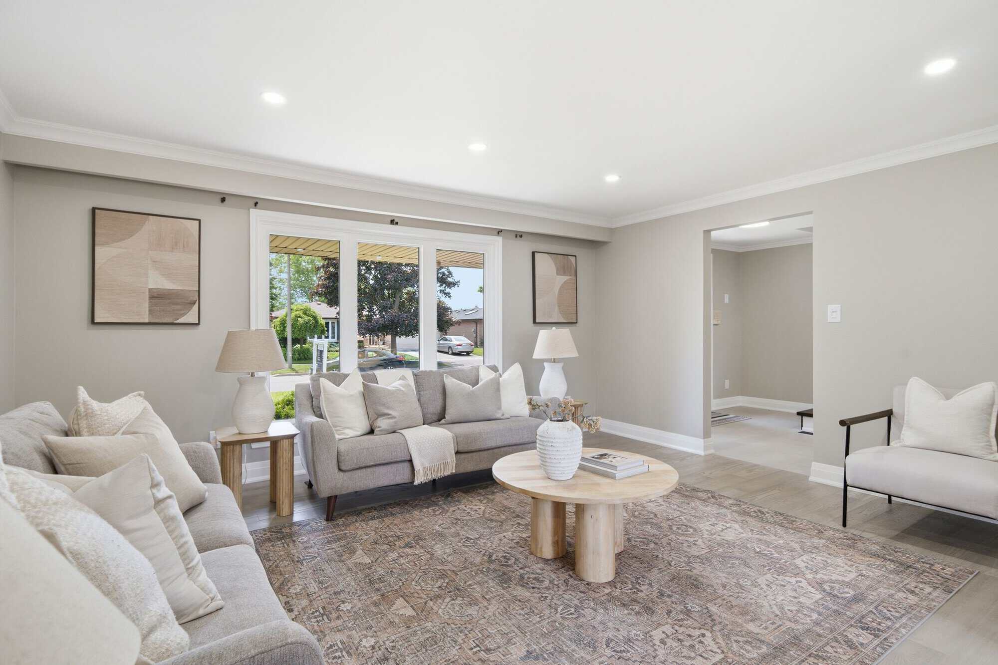 38A Deep Dene formal living room with crown moulding and updated lighting.